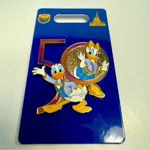 NWT. Disney Donald and Daisy 50th Anniversary pin. Walt Disney World collectible